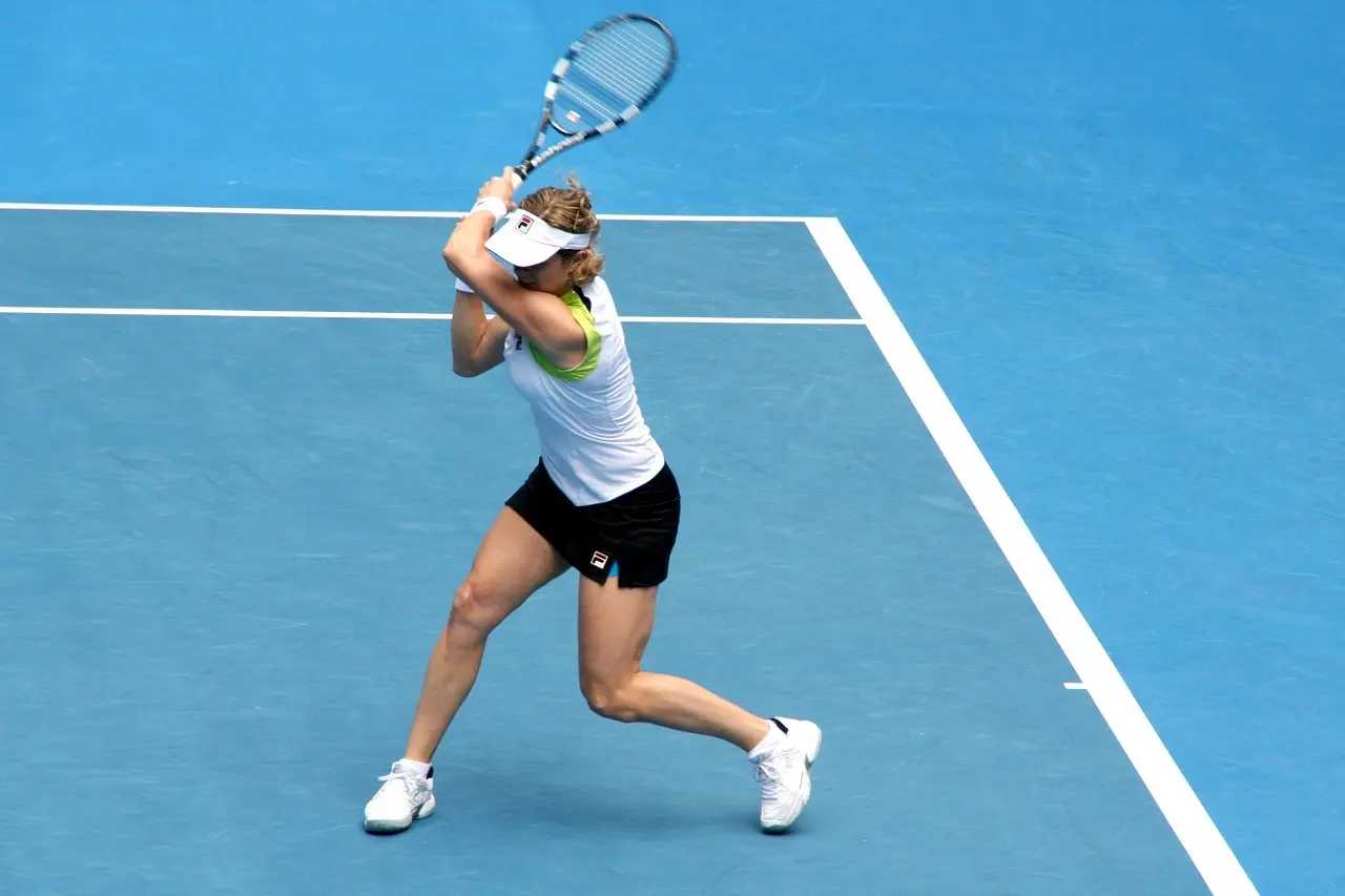 Tennisspiller på blå bane